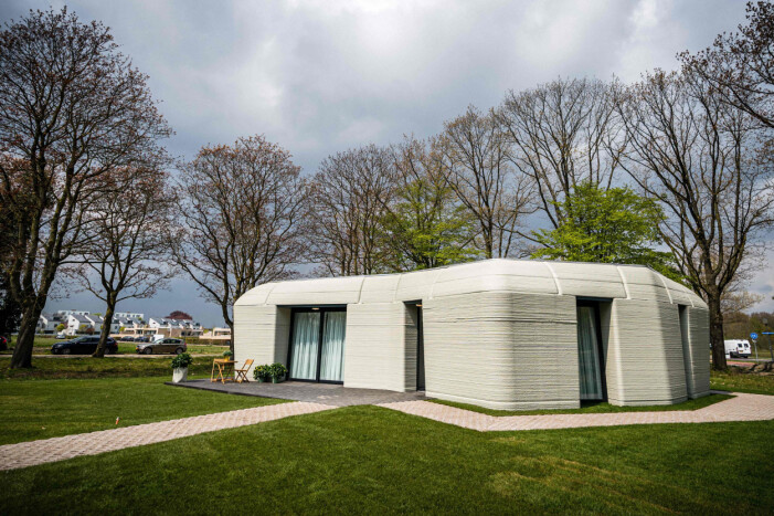 Det låga, 3D-printade huset är vackert beläget med naturen som granne. 3D-printat hus i Eindhoven
