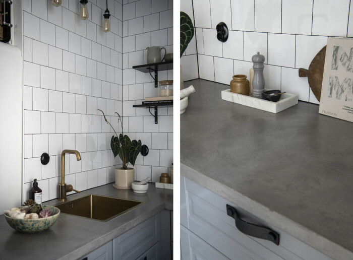 Vitt kakel och microcement på bänkskivan i köket