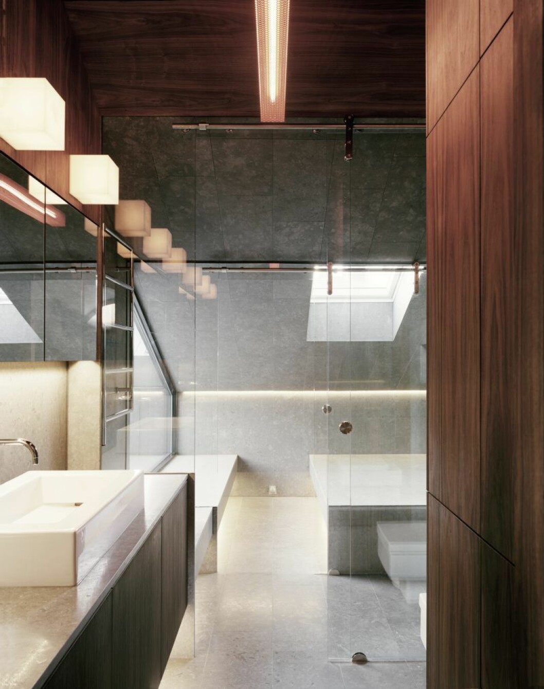 In praise of Loos apartment i Stockholm, en blinkning till tyske arkitekten Adolf Loos och en hyllning av materialen sten, trä och metall. badrum in praise of shadows