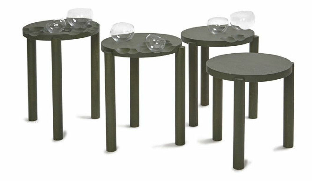 Dune satsbord & glasdetaljer består av fyra bord tillverkade av betsad ek samt sju tillhörande handblåsta glaskärl.<br>Pris i sek: 40 000:-<br>Design: Sofia Almqvist DUNE SATSBORD & GLASDETALJER Dune består av fyra bord tillverkade av betsad ek samt sju tillhörande handblåsta glaskärl. Pris i sek: 40 000:- Design: Sofia Almqvist