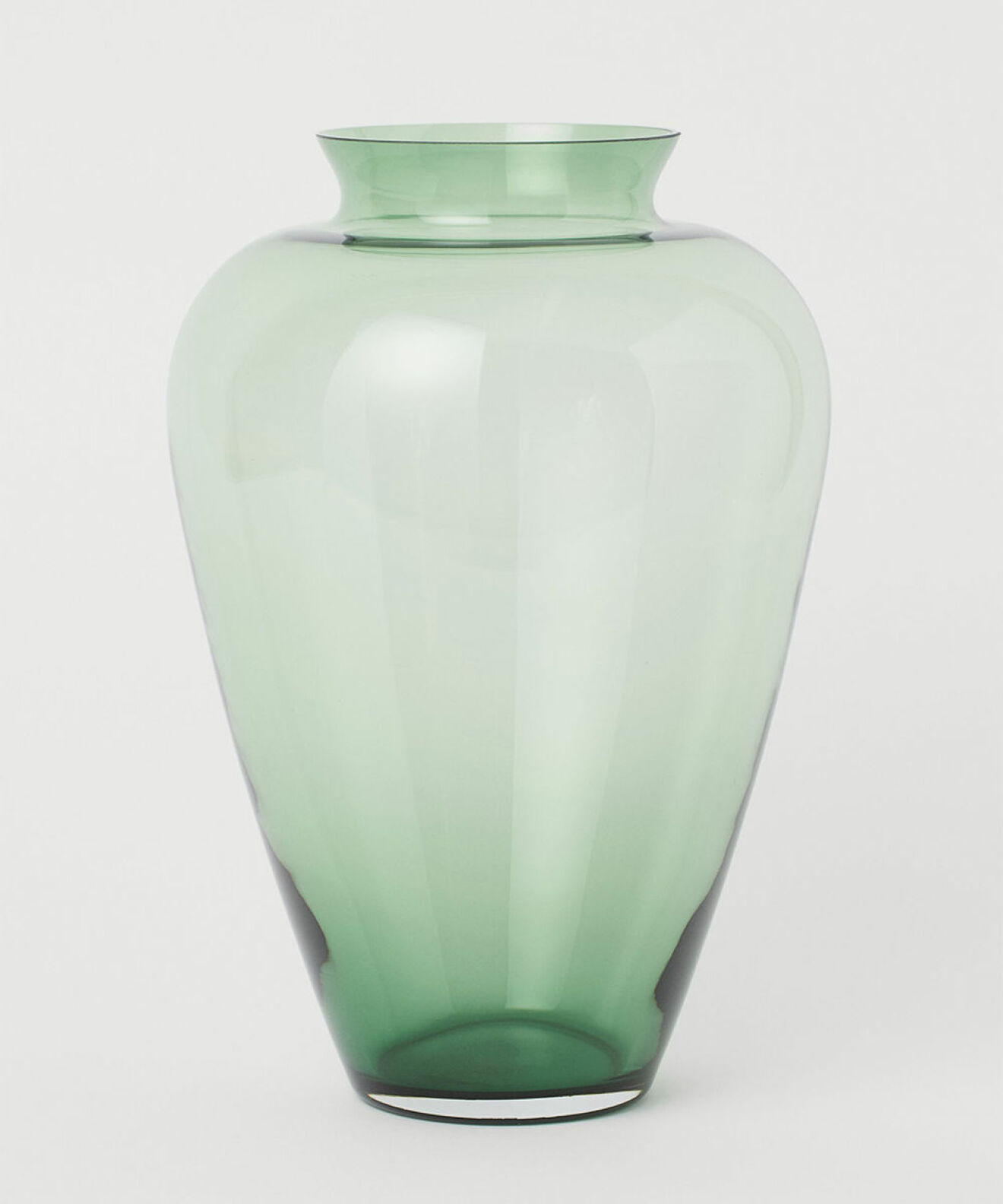 Grön vas i glas