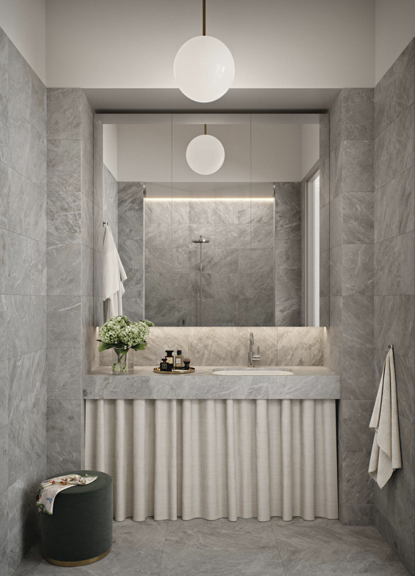 Materialer i badrummen är genomgående ljusgrå marmor med inspiration från en av Tony Craggs stenskulpturer i serien Lost in thought. 