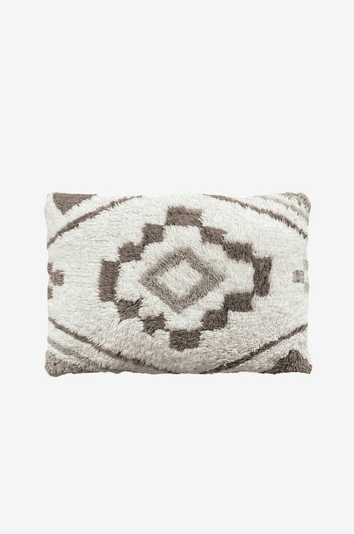 En kudde som ge nytt liv till soffan. Layered