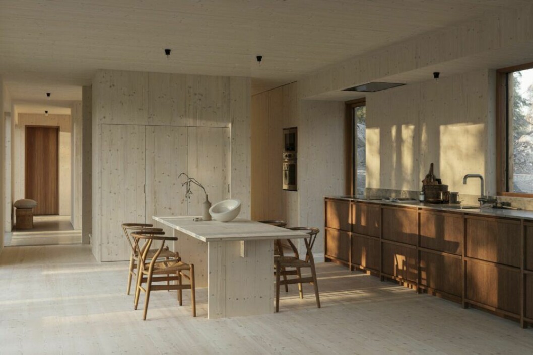 Martin har byggt köket på plats. »Enklast möjliga kök, det är bara en möbel som står där mitt i rummet. Som det är i moderna hus, köket är integrerat i vardagsrummet. Det är väldigt enkelt i sin form och behandlat med linolja och bivax.« Vintage skärbräda och keramik från Rusta. Matbord byggt av spillmaterial från huset. Vintage Y-stolar från Carl Hansen.